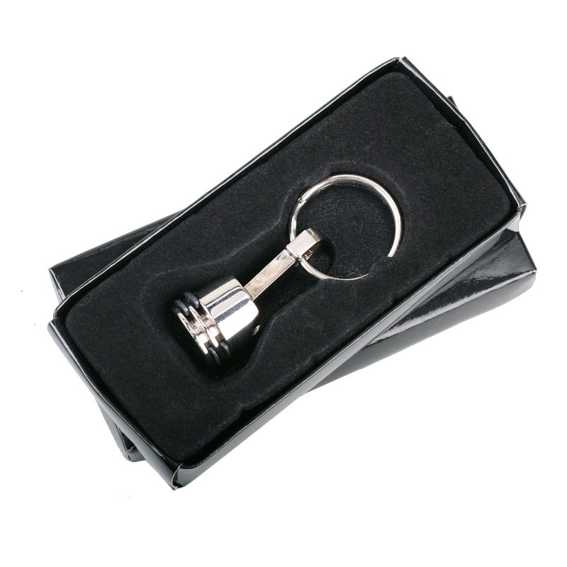 R73225 - Brelok metalowy Piston, srebrny